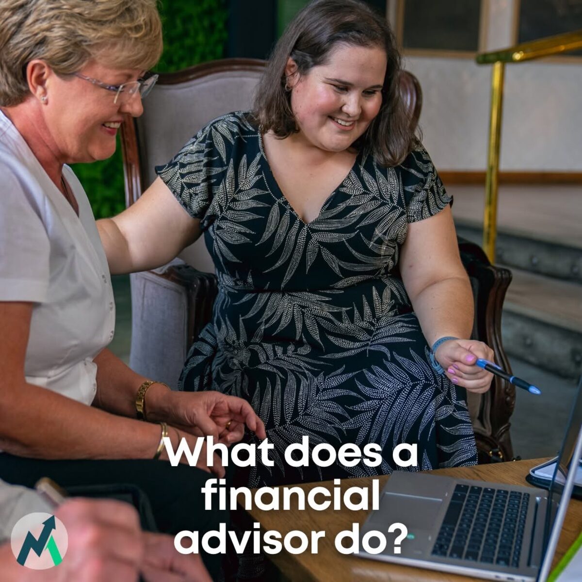 A Mogg Financial Advisors advisor going through a plan with a client